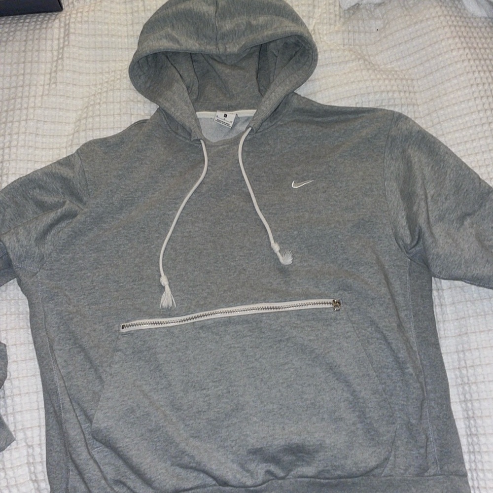 Grey Nike small swoosh standard issue hoodie. Size XL